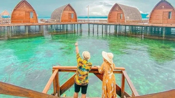 Liburan bersama pasangan, sumber viva.co.id